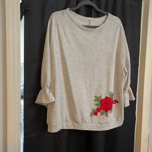 Easel grey sweater. Size large. Rose appliqué